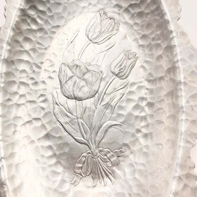 Marvelous elegant art nouveau style hammered tulip motif tray. Mid-century design, graceful oval shape with handles....