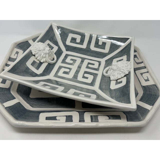 A deep square bowl in a solid graphite glaze with a hand-painted Greek key border running the rim. Made in Italy. As hand-...
