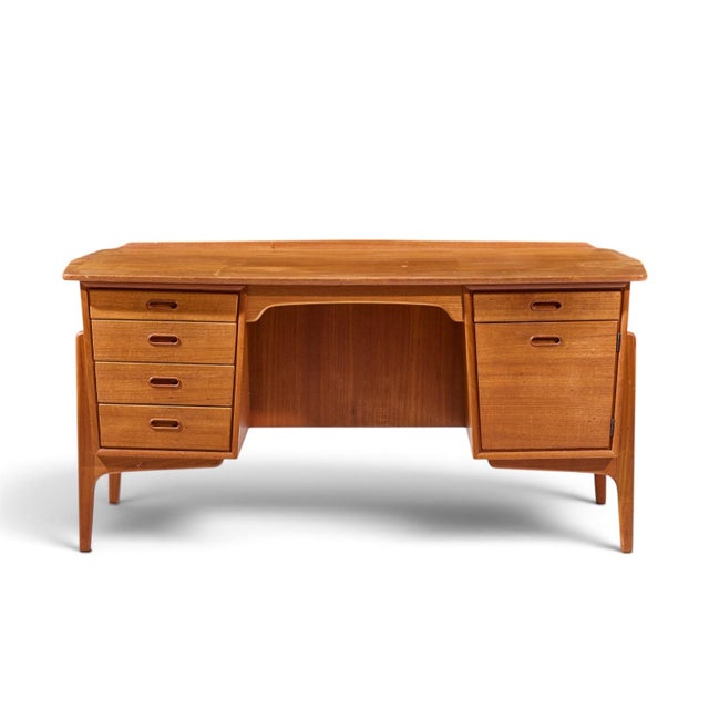Svend Madsen for Sigurd Hansen Mid Century Danish Teak Desk This desk measures: 59 wide x 29.5 deep x 29.5 high, with a...