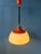Beautiful space age lamp with white acrylic glass shade and red metal top cap. The white and red combination creates the...