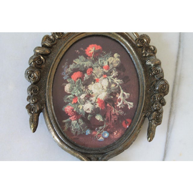 Vintage ornate brass miniature oval frame floral print wall hanging. Made in Italy. Minor age wear. Patina. Ready to hang.