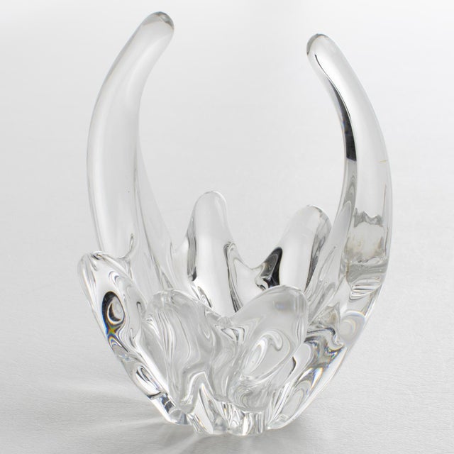 Enhance your private interior with this extraordinary Daum Nancy France bud basket crystal vase, a striking example of...