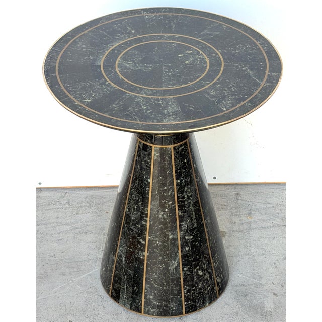 Modern Brass-Inlaid Tessellated Marble Side Table, Attributed to Maitland Smith This refined modern side table, attributed...