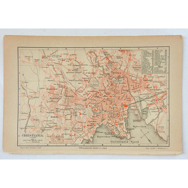 Small circa 1900 map of Oslo Christiana Norway book plate. Published in Germany. Unframed, age toning, edge wear.