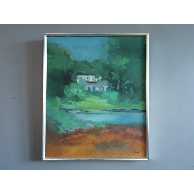 HOUSE BEYOND THE GREEN Size: 19.1 x15.7 inches (including frame) Oil on canvas The artwork is presented in wood frame that...