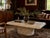 This vintage pedestal coffee table brings serious sculptural presence to a room. Featuring a substantial rectangular top...