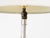 Pair of Art Deco faceted cut crystal lamps with curved circular bases and original patinated brass detail at top.