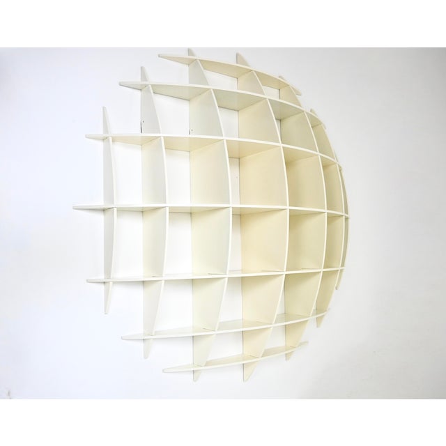 White wooden bookcase by Manfredo Massironi. Model: Tyco. wear due to time and age This piece is attributed to the...