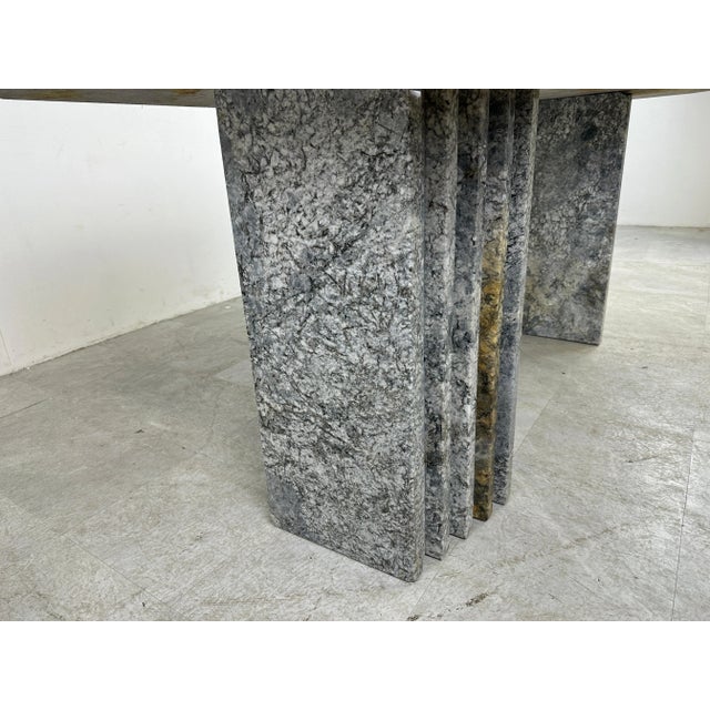 Vintage granite dining table with an architectural stepped double base. Amazing natural veining/motive in the stone. Good...