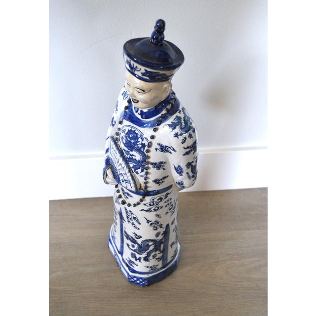 A Chinese Blue and White statuette of Emperor or Figure of Official in Dragon Robe; possibly an Emperor judging by the...
