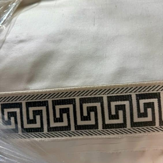 Elegant pair of Ethan Allen linen and silk pinch-pleat drapery panels in an soft cream tone with a gray Greek Key border....