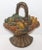 This fine cast iron door stop is in original painted surface and great condition. Really great paint. The basket is filled...