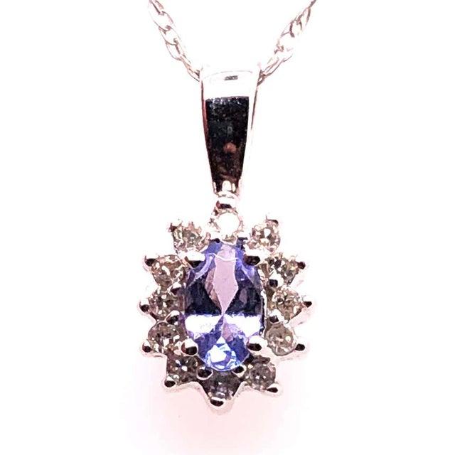 Contemporary 14 Karat White Gold Necklace With Diamonds and Oval Tanzanite Pendant For Sale - Image 3 of 12