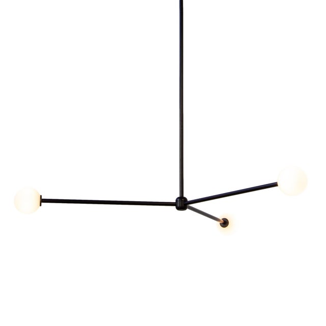 Three orbs, infinite mood. The Globe 3 floats in sync - bright, balanced, and a little bit fun.