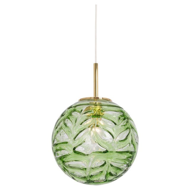 Large doria pendant light with green volcanic murano glass ball. High quality of materials, gives a wonderful light effect...