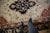:: Quatrefoil interlaced center medallion with interior floral palmettes, wrapped by inner and outer nuanced scalloped and...