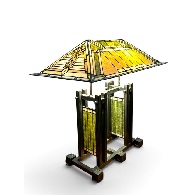 Stunning Dale Tiffany signed Frank Lloyd Wright Stained Glass Table Lamp. Zero cracks in glass. Sits on a bronze metal...