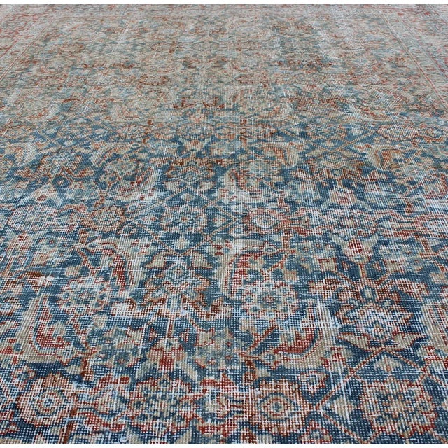 Measures: 4'3 x 6'4. Mahal rug antique Persian with floral design in red, blue, ivory, cream tones. Keivan Woven Arts /...