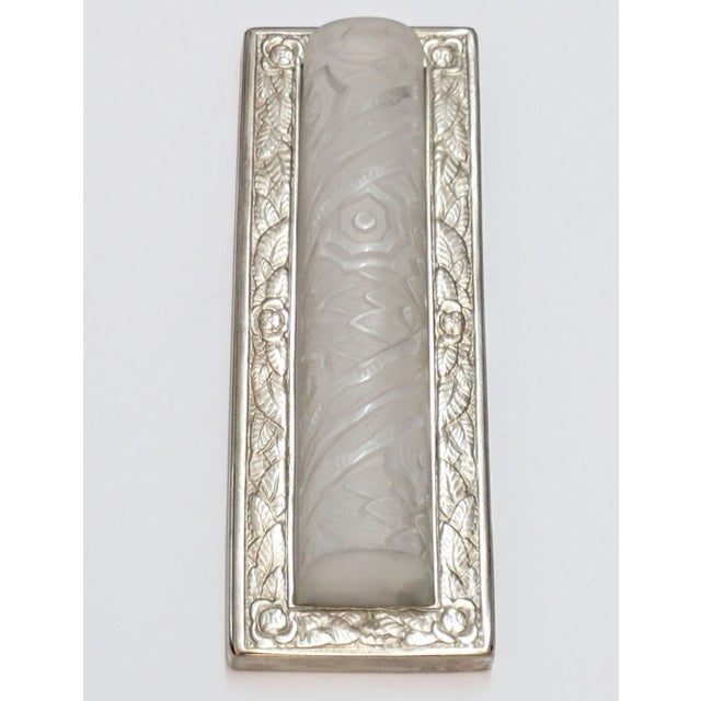 Stunning pair of French Art Deco sconces were created by the French artist "Schneider". Frames are in satin nickel bronze...