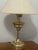 Warm, sculptural, and unmistakably mid‑century lamp. Cast brass urn‑style lamp with a turned baluster column—possibly a...