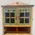 An exceptional 1871 Scandinavian Folk Art step-back cupboard, representing a soulful survival of 19th-century Nordic...