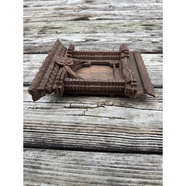 This Lovely Carved Tibetan Nepal Ankhi Jhyal Wooden Frame is a unique and intricately crafted piece originating from...