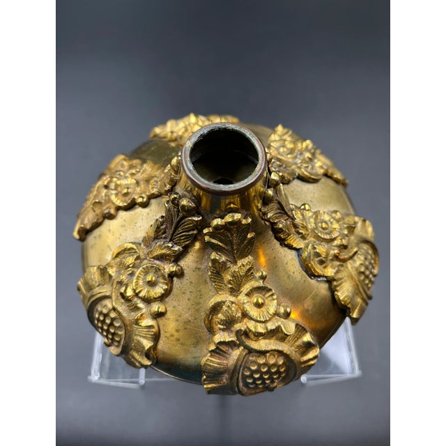 Exquisite French candle holder from late 19th Century. Decorated with six (6) medallions that are screwed to the candle...