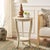 The Mary Pedestal Side Table, crafted of pine with a sabd finish, is the perfect accent for any room in need of a feminine...