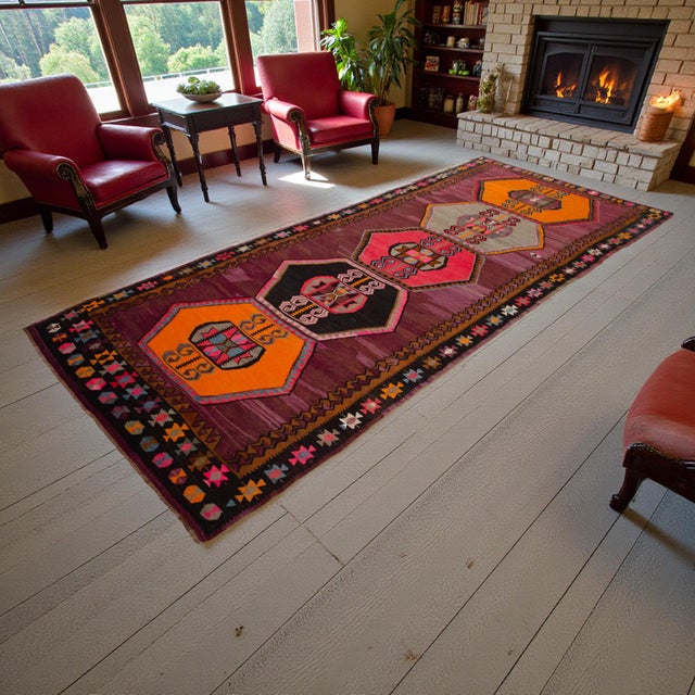 This exceptional vintage runner, handwoven in the 1970s in the Kars region of Eastern Anatolia, exemplifies the bold...