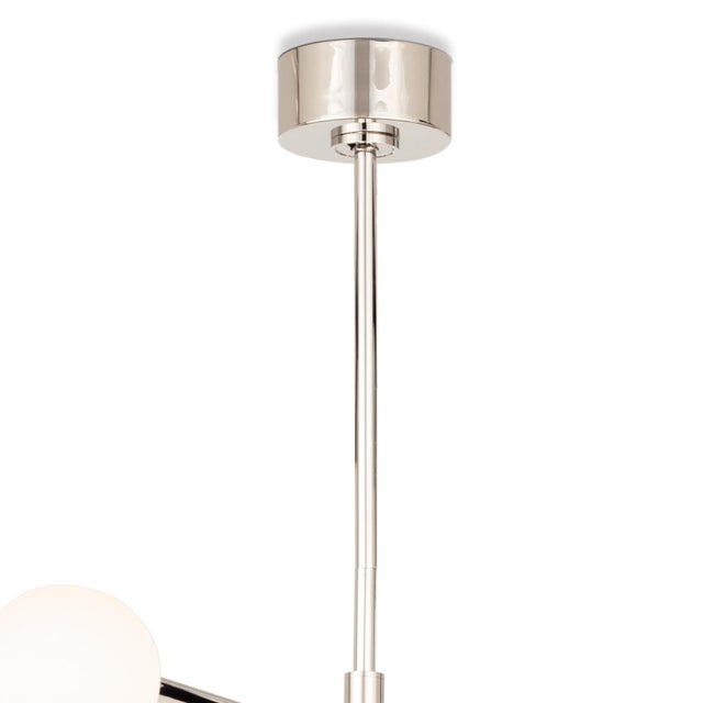 Four arms swivel around a center point on our modern, linear Beaubien Chandelier. Create a unique, dynamic design in your...