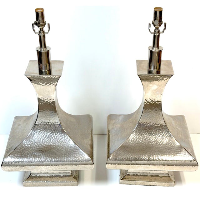 Pair of Monumental Hand-Hammered Silver-Plated Modernist Table Lamps This pair of monumental hand-hammered silver-plated...