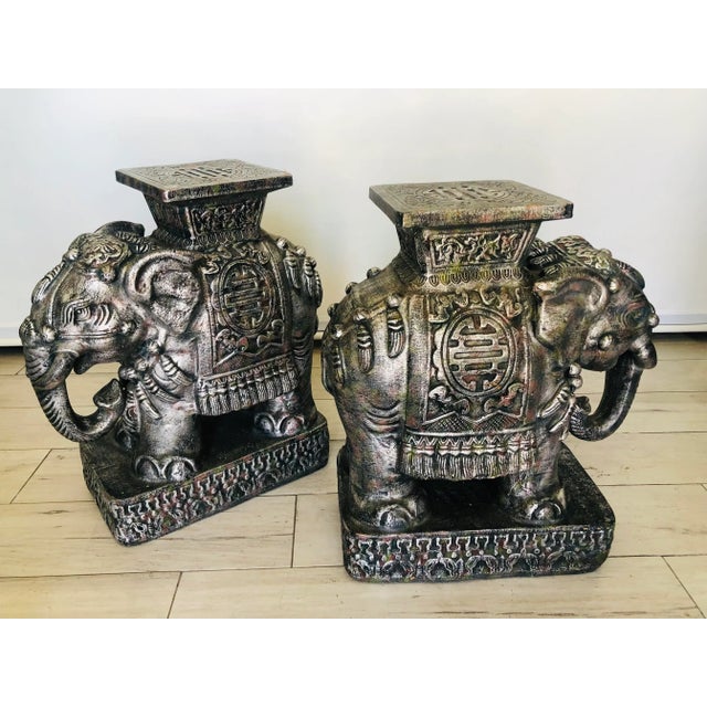 Rare & beautiful weather pair of Chinese export elephant the perfect side table or extra sitting. Hand painted with Asian...