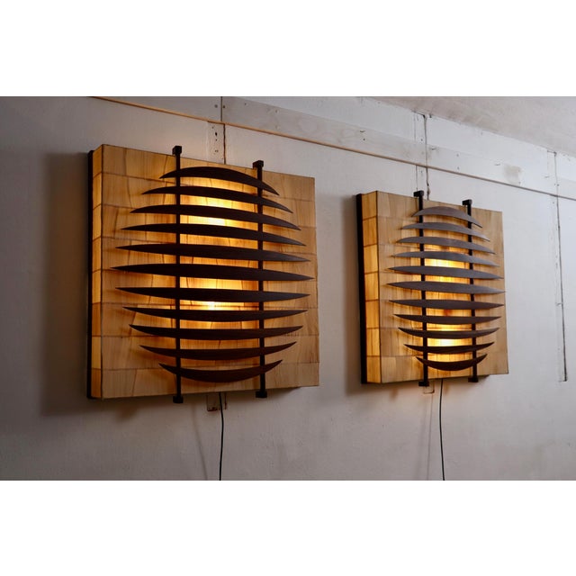 Incredible pair of Italian wall lights or sconces from the 1970s, made from walnut wood and paper. Each light features a...