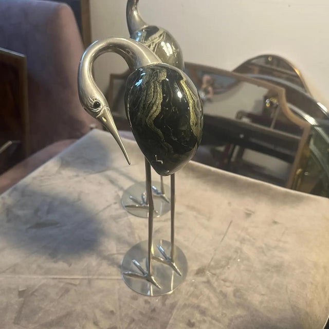 This is a magnificent, matching pair of Italian Mid-Century Modern Herons sculptures, crafted in the 1960s by De Stijl...