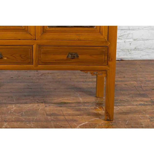 Chinese Early 20th Century Lacquered Armoire With Gilt Carved Warrior Motifs For Sale In New York - Image 6 of 18