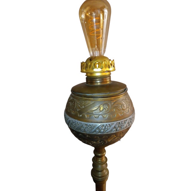 Rare vintage solid bronze, brass and silver round three tiered floor lamp with engraved floral and foliate decoration, paw...