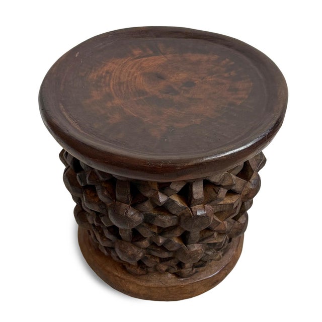 Authentic vintage hand carved Bamileke tribal wood stool/side table. Masterfully crafted from one piece of indigenous...