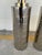 Stylish Ralph Lauren Modern Polished Nickel Lamps - Pair. Heavy body, silver hardware. Cylinder shape. Showroom floor sample.