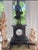 Impressive late 19th-century French mantel clock featuring a richly figured dark marble case surmounted by a patinated...