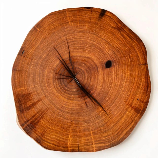 A handcrafted mesquite cross-section slab top table with walnut legs. The naturally irregular, organic top preserves the...