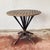 A unique, rustic , Folk Art piece. This circular table is perfect for a hallway, or any space that requires a centre...