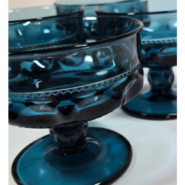 These fabulous deep, dark jewel toned aquamarine champagne coupes are thick, intricately detailed and dripping with style....
