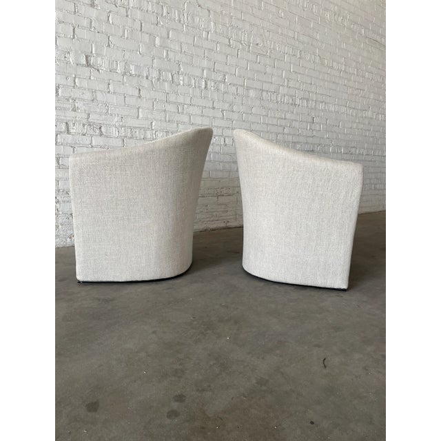 An incredible sculptural pair of chairs designed by Jack Dunbar and Lydia dePolo for Dunbar Furniture. With amazing lines...