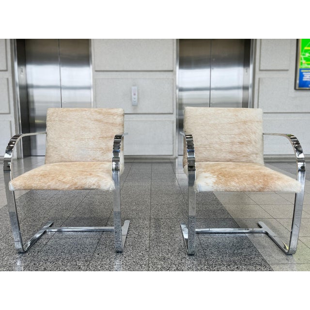 Made in the Late 20th Century, this pair of armchairs takes after the iconic Brno chairs originally designed by Ludwig...