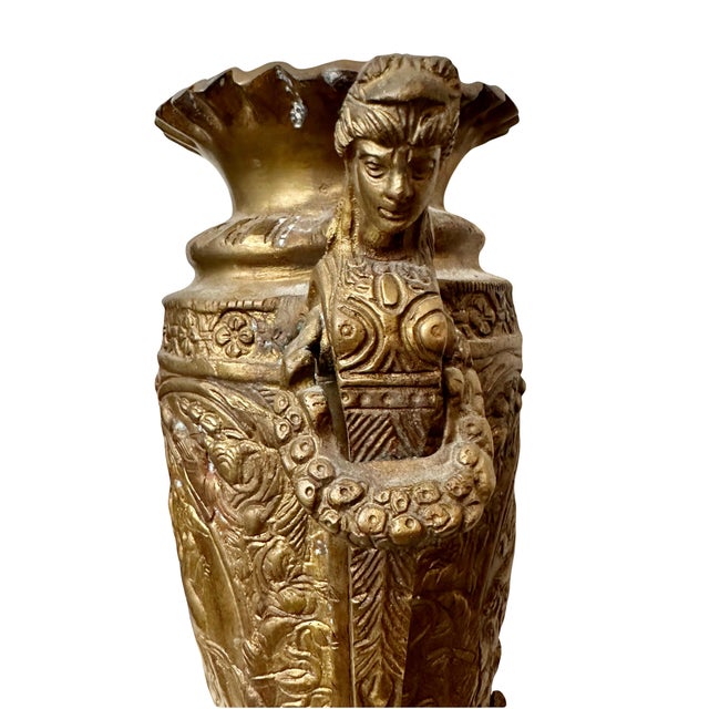 Pair of Bronze French Neoclassical Figural Handle Urn. Solid bronze gilt. Measures 15” tall