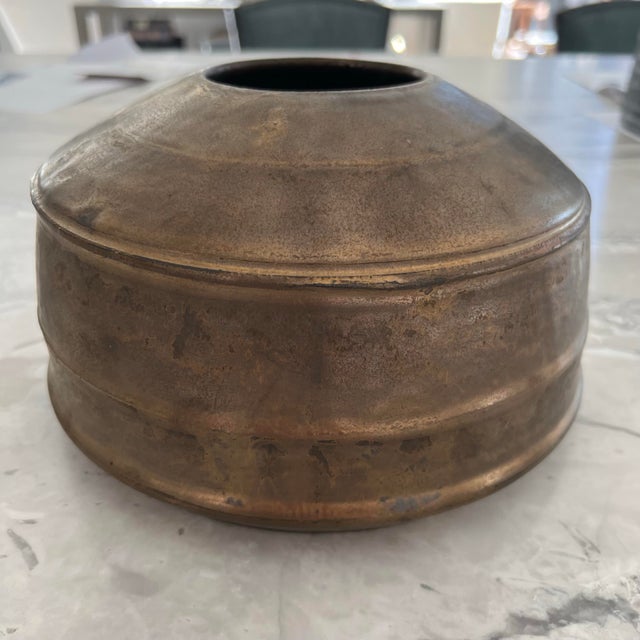 Sculpture handmade pottery in a modern bronze design. Will look beautiful as a centerpiece or accessorized on a bookshelf....