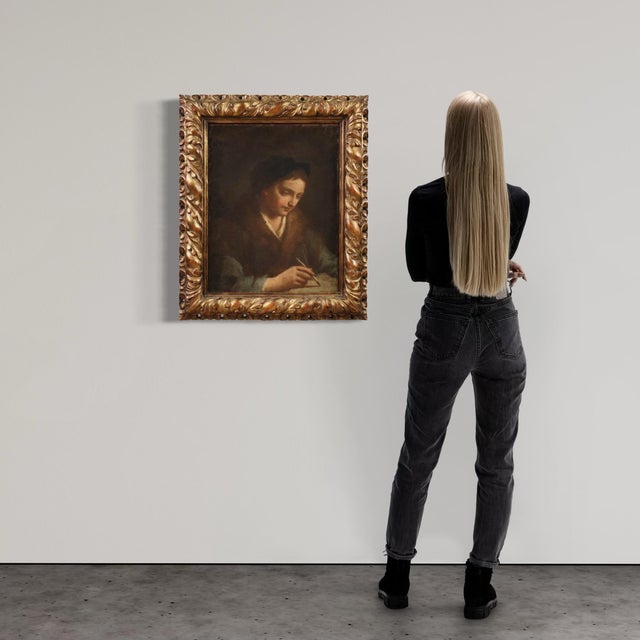 Antique 17th-century Italian painting. Oil on canvas artwork depicting the portrait of a young scholar/artist with...