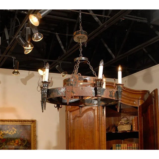 19th century, French black iron chandelier with Fleur de lis Designs, one of a kind.