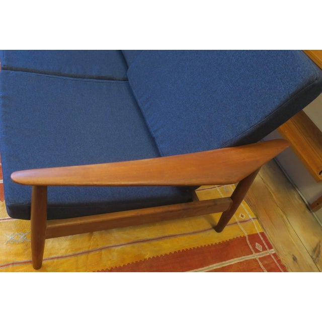 Arne Vodder for France and Sohn 3-seater teak sofa, 1960s. France and Sohn label. The cushions recently re-covered with...