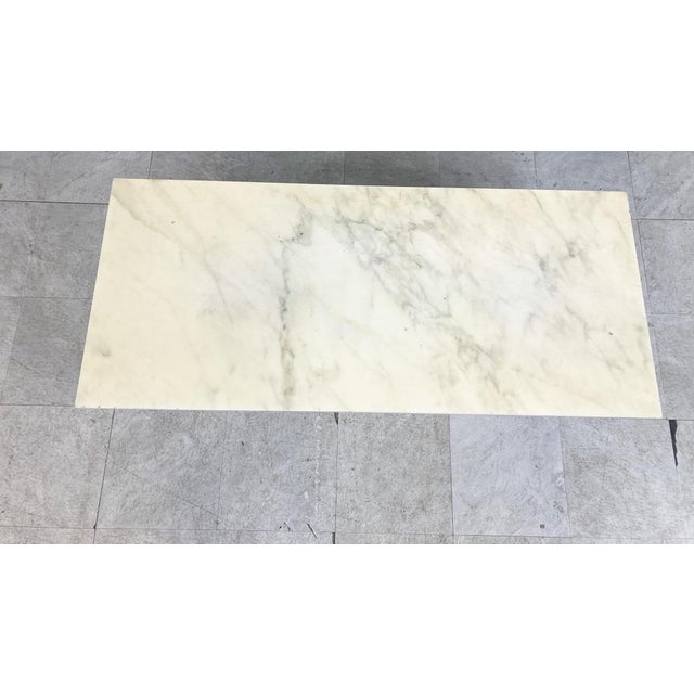 Vintage white marble coffee table with a chromed metal base. Timeless piece to be combined with most interiors. Good...